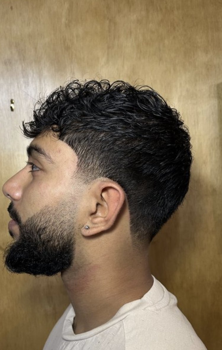 low taper fade with curly top and beard by Jonathan, Land of Barbers Greenpoint