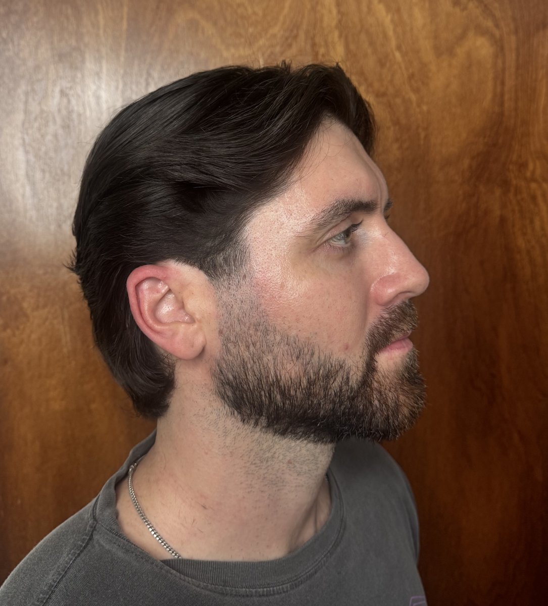 medium haircut with mid-size flow and tapered sides by Jonathan, Land of Barbers Greenpoint