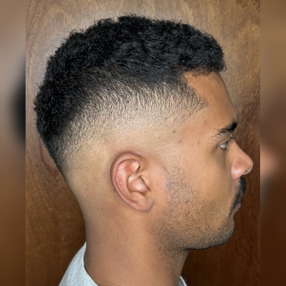 Skin fade on curly hair by Jonathan, Land of Barbers near Williamsburg Brooklyn